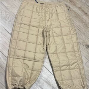 The North Face Women's Lhotse Pants in the "Khaki Stone" colorway.